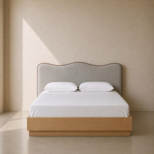 Winslet floor-standing upholstered headboard with a soft curved silhouette, positioned behind a wooden platform bed in a modern minimalist bedroom.