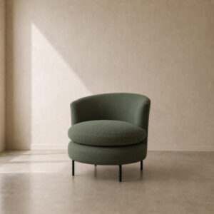 Infinity Occasional Chair with a curved wraparound backrest, rounded cushioned seat and slim steel legs.